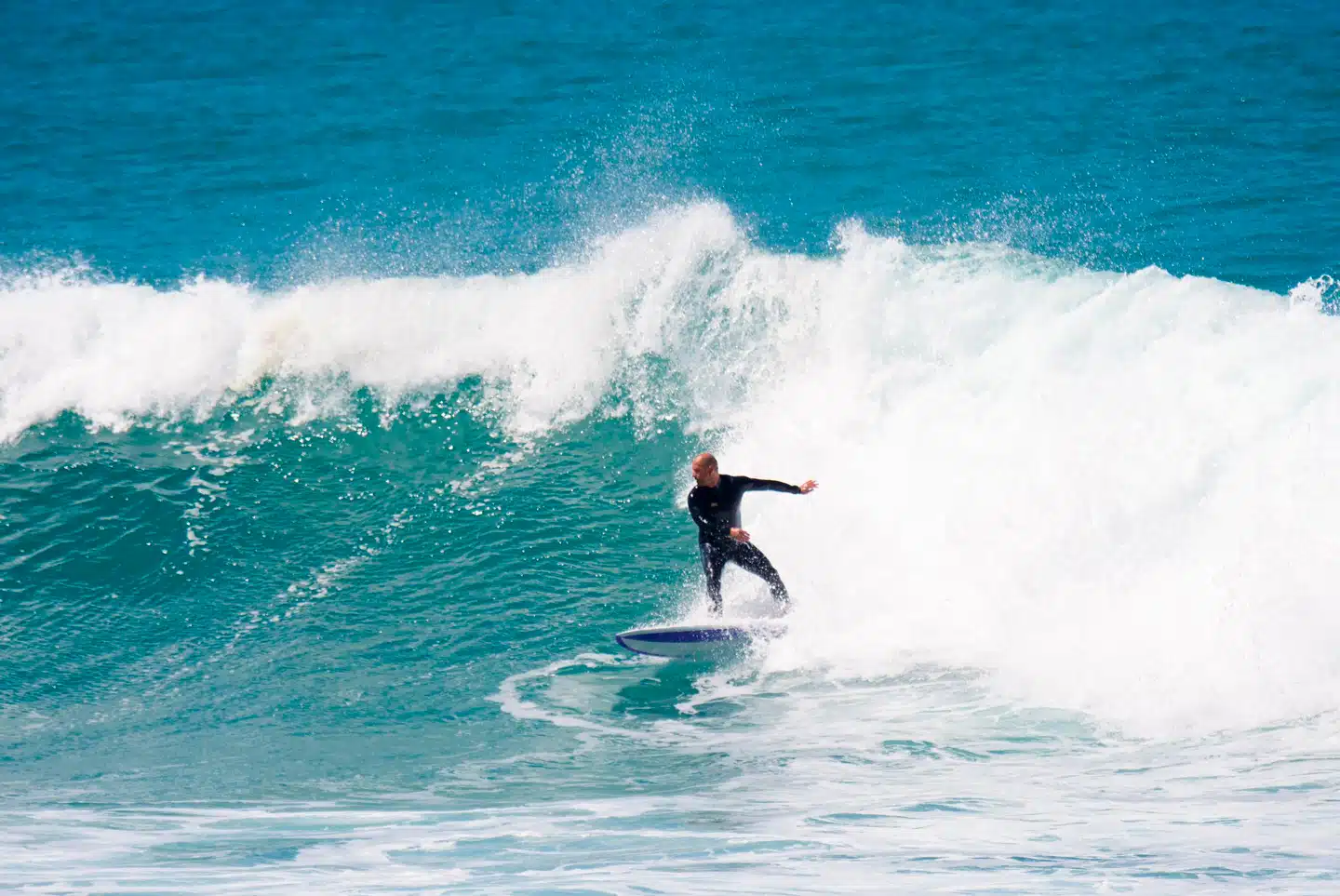 Rui Ferreira backside bottom turn - Sea Krew founder surf coaching Ericeira Portugal