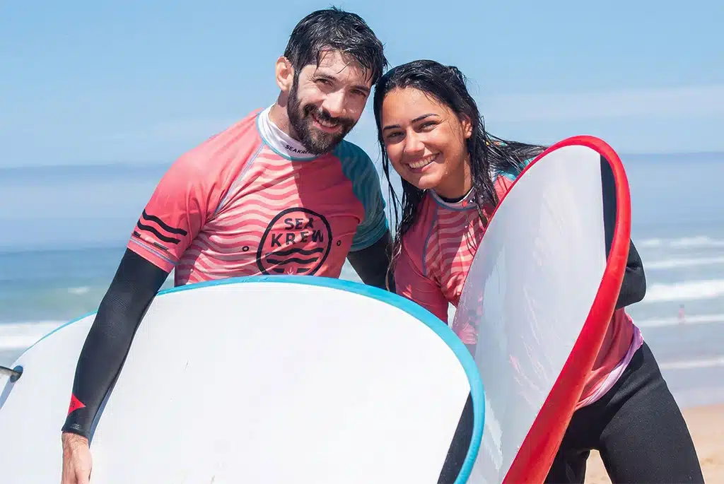 Happy Sea Krew guests celebrating after their surf experience