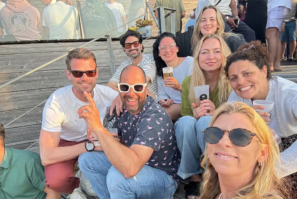 Guests celebrating after a surf session at Sea Krew Portugal