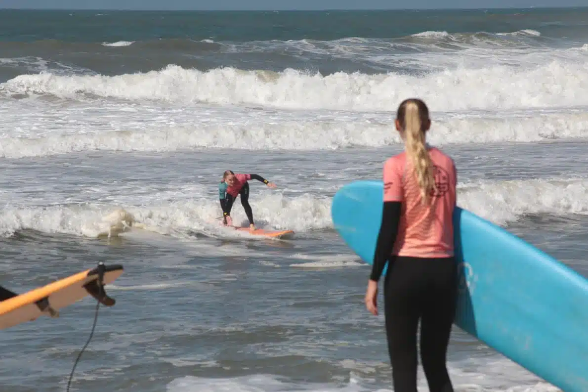 Sea Krew surf lesson student surfing a wave in Ericeira Portugal