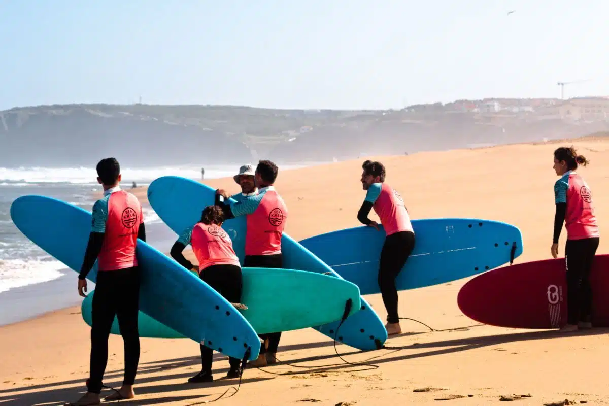 Small group beginner surf lesson with a coach in Ericeira