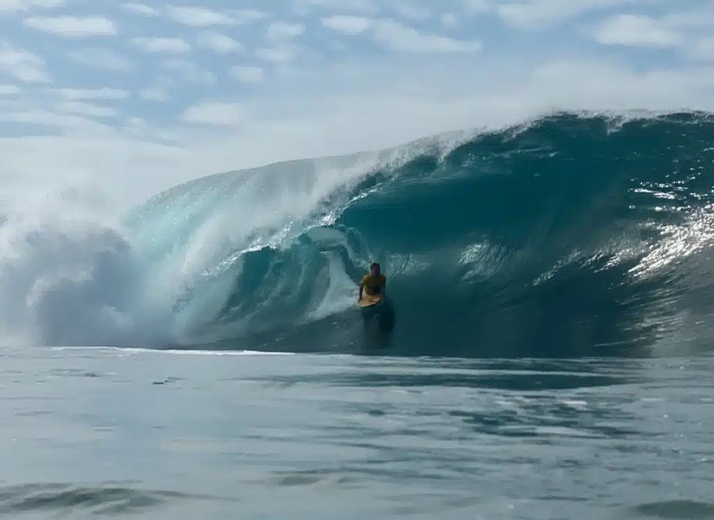 Rui Ferreira riding a heavy bodyboard barrel