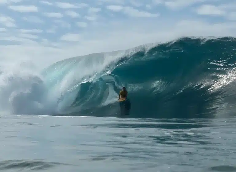 Rui Ferreira riding a heavy bodyboard barrel