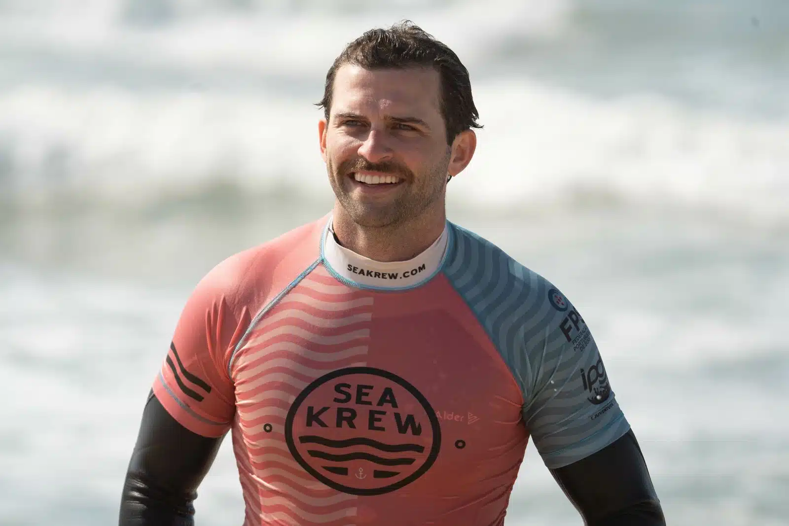 Happy Sea Krew surf club member smiling after a session in Ericeira