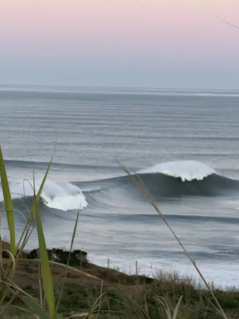 Dawn swell lines arriving at Nazaré, Portugal