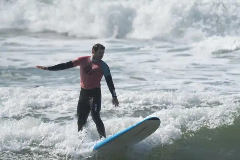 Sea Krew Surf Club member surfing a clean wave in Ericeira, Portugal